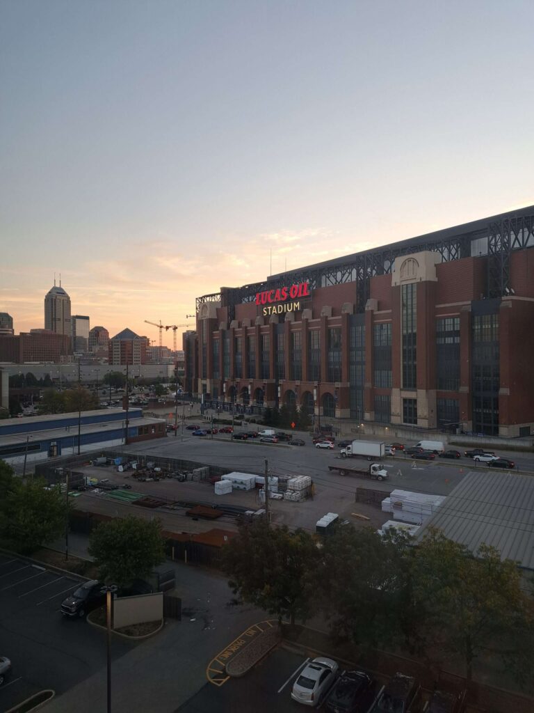 The Lucas Oil Stadium at dusk in downtown Indianapolis