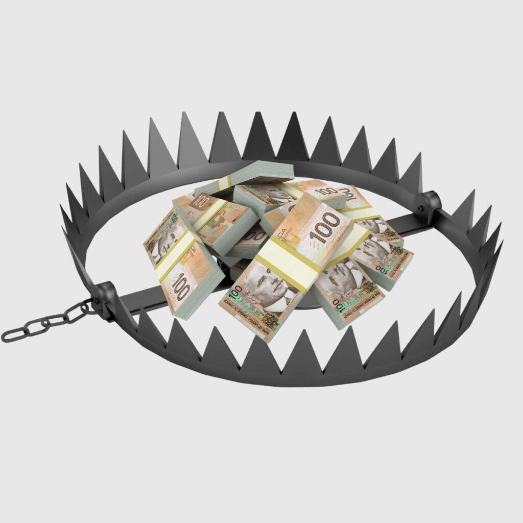 Stacks of Canadian $100 bills placed inside a metal bear trap