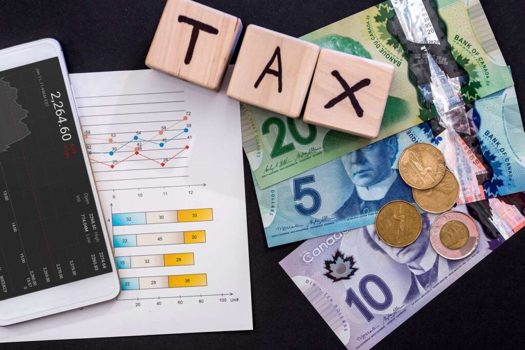 Taxation concept image with Canadian cash